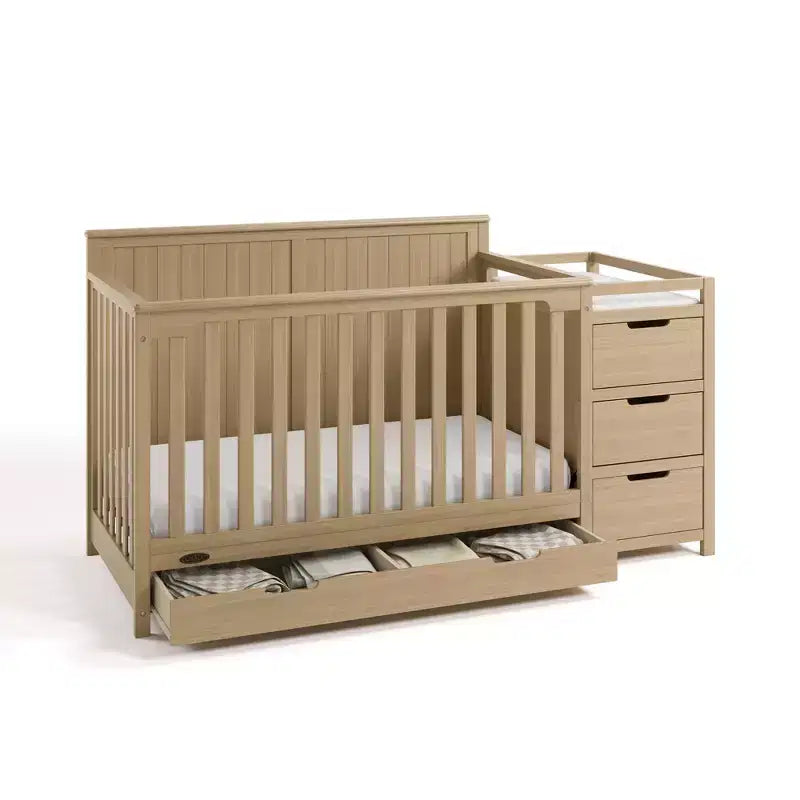 5-in-1-Umbaubett für Babys mit Wickelaufsatz und Schublade