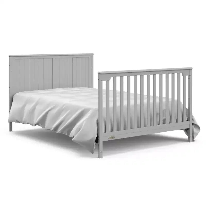 5-in-1-Umbaubett für Babys mit Wickelaufsatz und Schublade