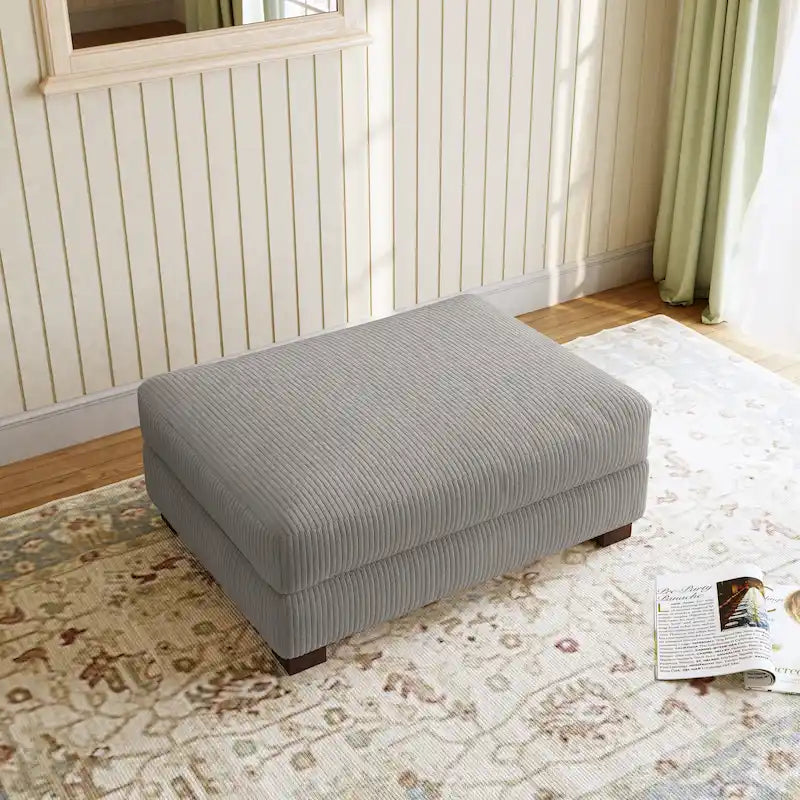 Pouf moderno oversize in tessuto a coste